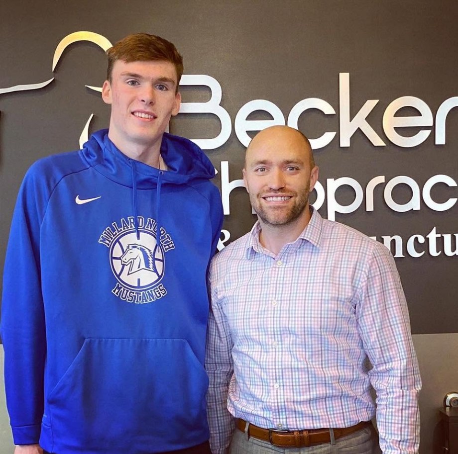 Stanford basketball player Max Murrell with Dr. Dane Becker at Becker Chiropractic in West Omaha