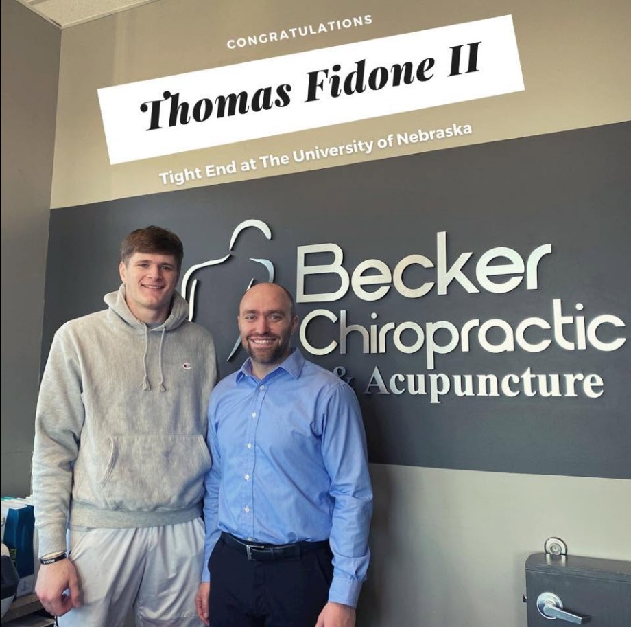 New York Giants tight end Thomas Fidone II with Dr. Dane Becker at Becker Chiropractic